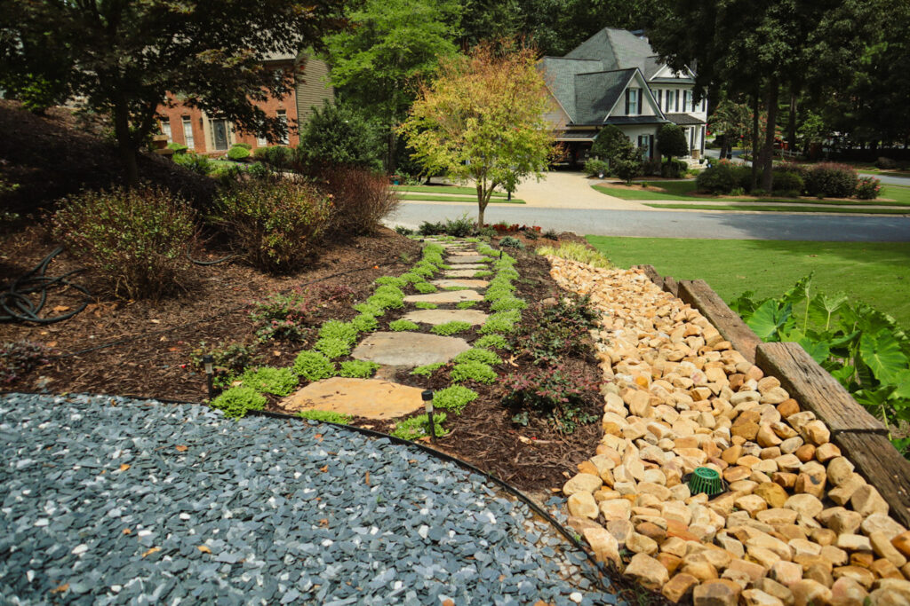 Garden with stone pathway and colorful plants